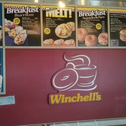 Photo taken at Winchell&#39;s Donuts by Brian H. on 11/23/2011