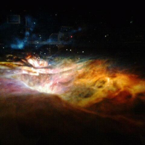 Photo taken at Great Clips IMAX Theater by Mary H. on 2/18/2012