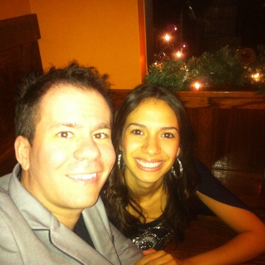 Photo taken at Ivarone&#39;s Steakhouse &amp; Italian Grill by Ryan L. on 12/18/2011