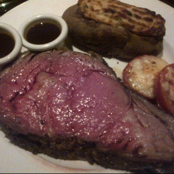 Photo taken at The Keg Steakhouse + Bar - Morgan Creek by BOHICA M. on 2/20/2012