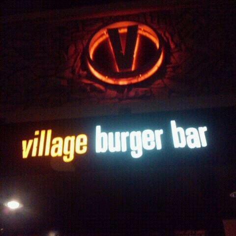 Photo taken at Village Burger Bar by Tan N. on 1/8/2011