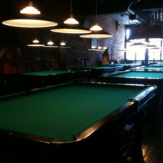 Photo taken at Zanzibar Billiards Bar &amp; Grill by Jessica M. on 7/30/2011