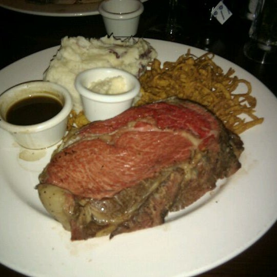 Photo taken at The Keg Steakhouse + Bar - Coquitlam by Simon K. on 2/26/2011