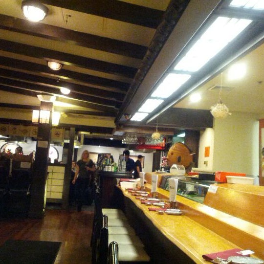 Photo taken at Osaka Japanese Steakhouse &amp; Sushi Bar by Katherine K. on 1/14/2012