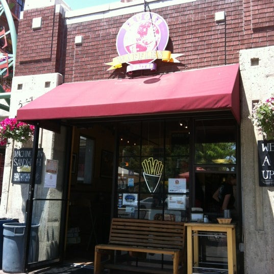 Photo taken at Bruges Waffles &amp; Frites by Cody B. on 6/15/2012