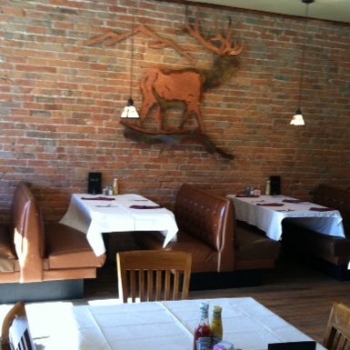 3/5/2012 tarihinde Buglin&#39; Bullziyaretçi tarafından Buglin&#39; Bull Restaurant and Sports Bar'de çekilen fotoğraf