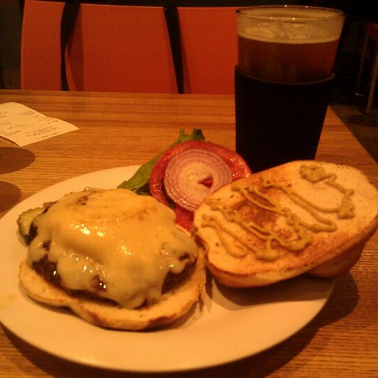 Photo taken at 67 Burger by T. S. C. on 7/26/2012