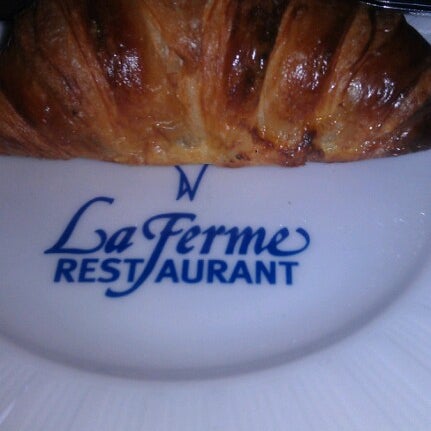 Photo taken at La Ferme Restaurant by Rachel M. on 7/15/2012