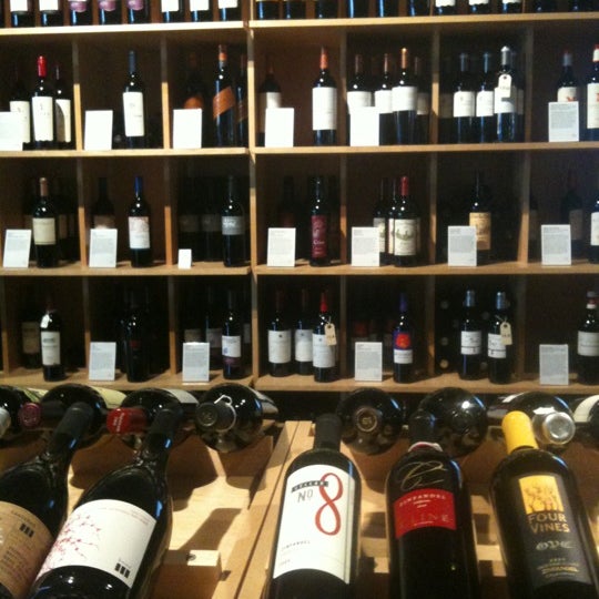 Photo taken at Woodland Wine Merchant by Cheryl K. on 3/17/2012