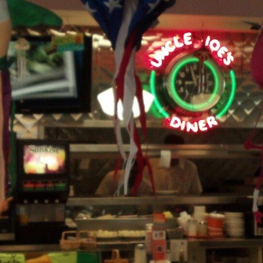 Photo taken at Uncle Joe&#39;s Diner by Bridget H. on 7/21/2012
