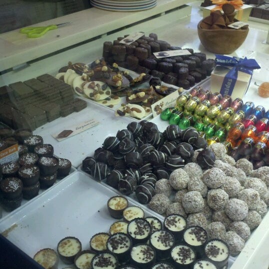 Photo taken at Leonidas Chocolate by Amanda A. on 8/18/2012