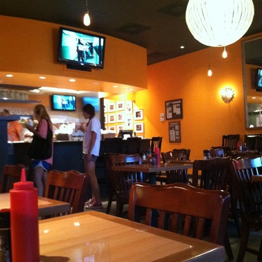 Photo taken at Island Grill by Cynthia N. on 6/8/2012