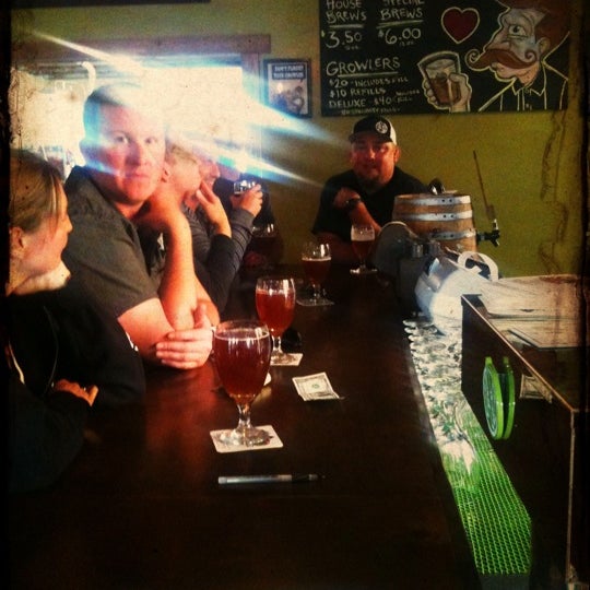 Photo taken at Crooked Fence Brewing Taproom by Jared B. on 5/13/2012