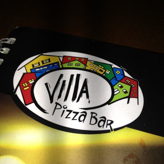 Photo taken at Villa Pizza Bar by Raphael C. on 5/30/2012