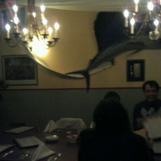 Photo taken at Sweeney&#39;s Seafood Restaurant by Michelle T. on 1/29/2012