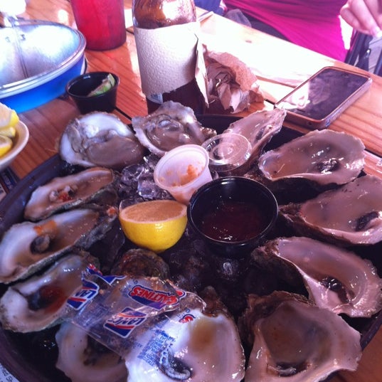 Photo taken at Bluewater Seafood - Champions by Lewis D. on 3/12/2012