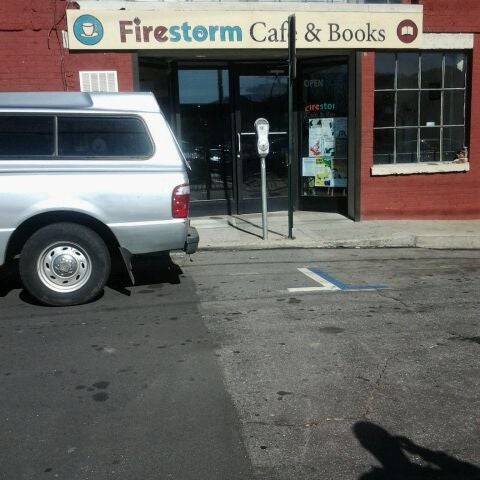 Photo taken at Firestorm Cafe &amp; Books by Terrence B. on 2/13/2012
