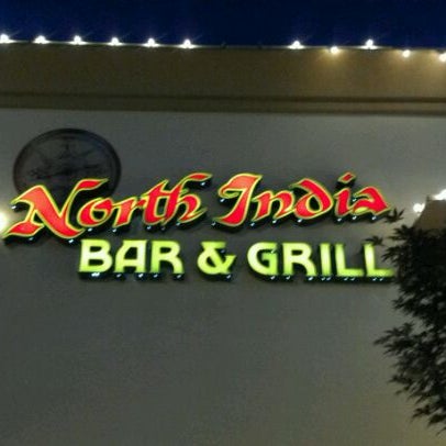 Photo taken at North India Bar &amp; Grill by Lari N. on 5/22/2012