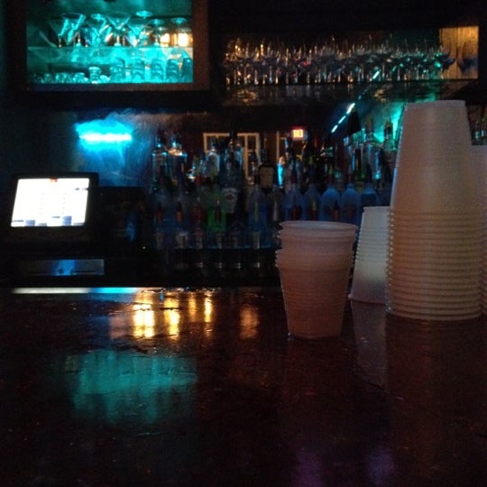 Photo taken at Knight Library Sports Bar &amp; Grill by Courtney N. on 4/3/2012