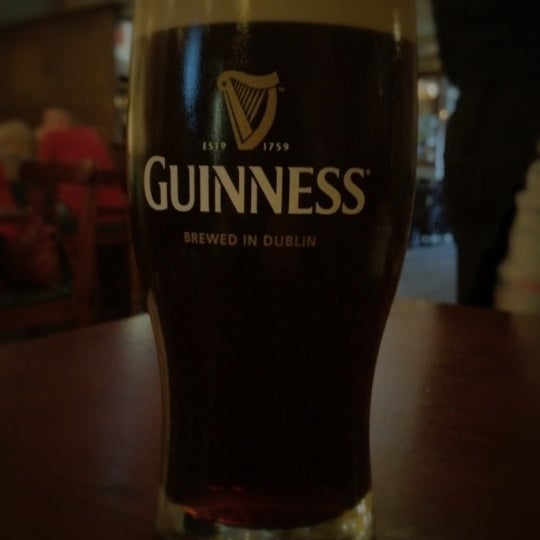 Photo taken at Dubh Linn Square Irish Pub by Phil J. on 3/18/2012
