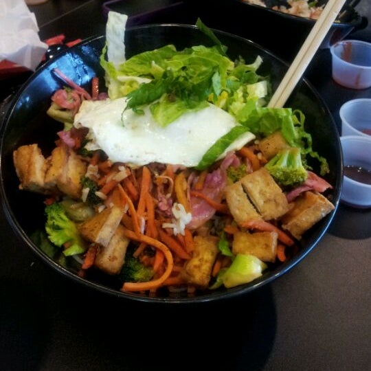 Photo taken at B.B.Bop Seoul Kitchen by Jennifer T. on 2/16/2012