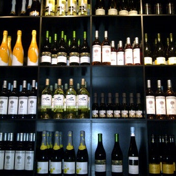 Photo taken at The Tasting Room Wine Bar &amp; Shop by Julie M. on 12/16/2011
