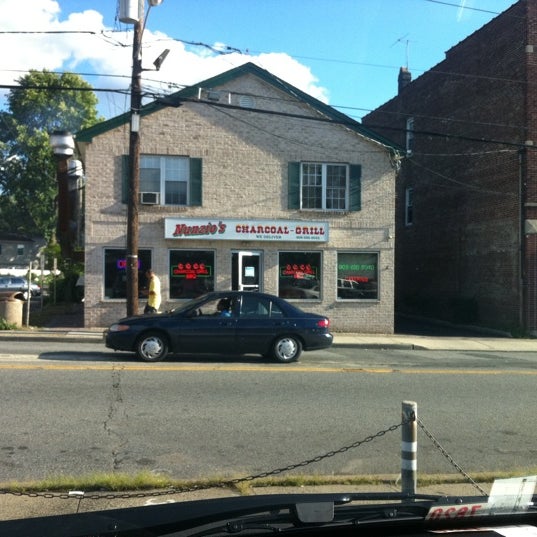 Photo taken at Nunzio&#39;s Charcoal Grill by Damian C. on 8/22/2011