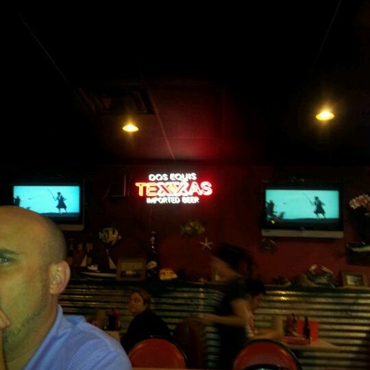Photo taken at Crawfish Shack &amp; Oyster Bar North by Claudia G. on 5/31/2012