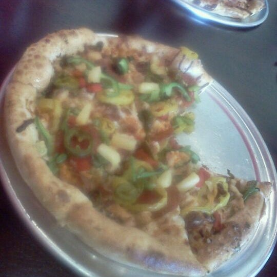 Photo taken at Top It Pizza by Calvin V. on 5/9/2012