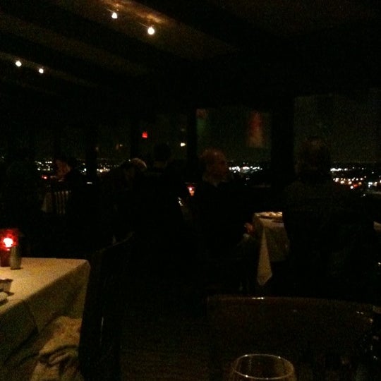 Photo taken at Simms Steakhouse by Anna G. on 2/20/2012