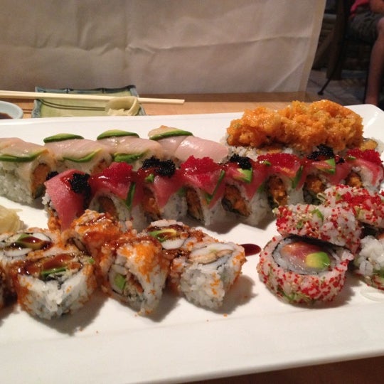 Photo taken at Murasaki Restaurant and Sushi Bar by Jelena Z. on 8/19/2012