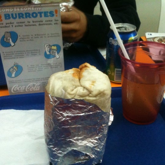 Photo taken at Q&#39;Burrotes! by Erik R. on 4/17/2012