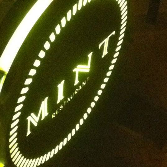 Photo taken at Mint Restaurant by Tshepo M. on 12/15/2011