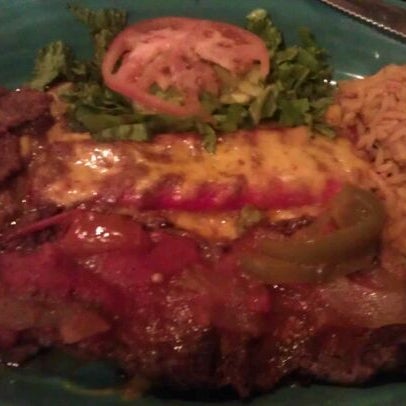 Photo taken at El Chaparral Mexican Restaurant by Susan B. on 12/16/2011