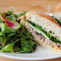 Order locally sourced salads and sandwiches--including the awesome pork belly with crisp apple slices--paired with a glass of wine at the cafe.