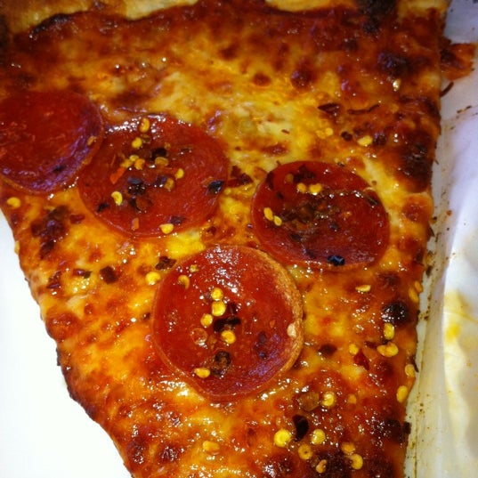 Photo taken at VI Pizza by Montana on 3/20/2012