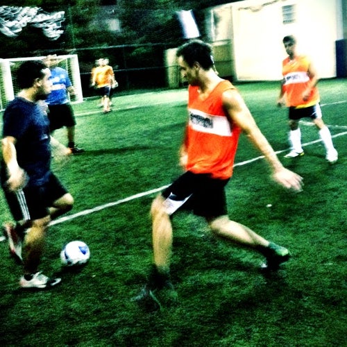 Photo taken at Downtown Soccer by Adrian P. on 9/5/2012