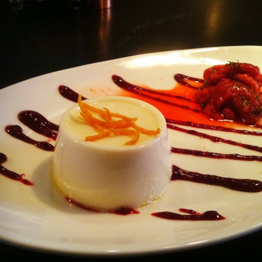 The Orange Blossom Panna Cotta w/ blackberries coulis, and candied orange strips. Bomb.