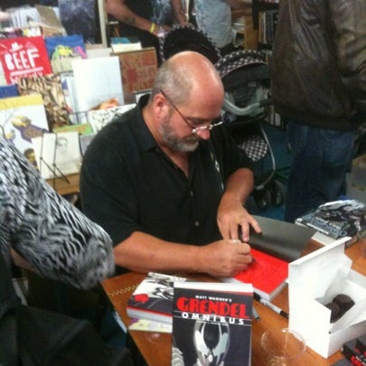 Photo taken at Floating World Comics by Shannon S. on 8/3/2012