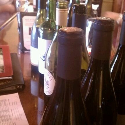 Photo taken at Nirvana  Wine and Grillerie by Kristin B. on 3/25/2012