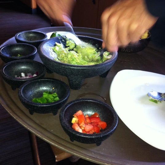 Photo taken at Cantina Laredo by Andrea S. on 8/1/2011