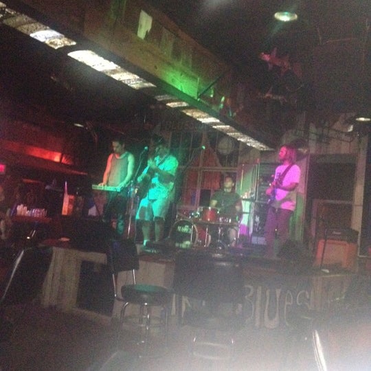 Photo taken at Graffiti &amp; Funky Blues Shack Destin by Cyndie S. on 8/1/2012