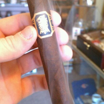 Photo taken at Crossroads Cigars by Nick C. on 2/26/2012