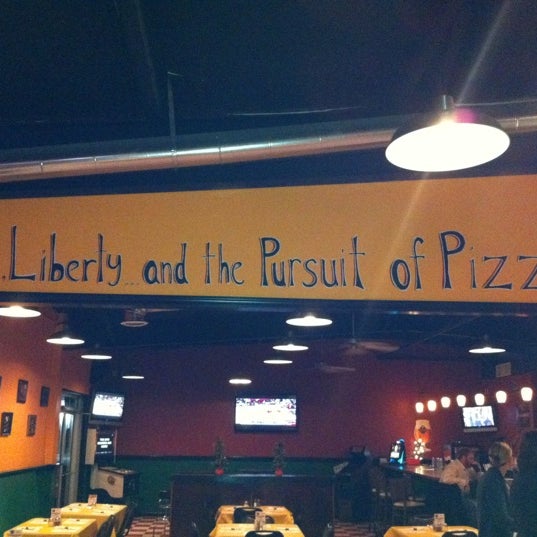 Photo taken at Belmont Pizza and Pub by Harry H. on 12/15/2011