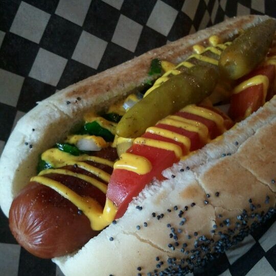 Photo taken at Juicy Dog by Kelly S. on 6/26/2011