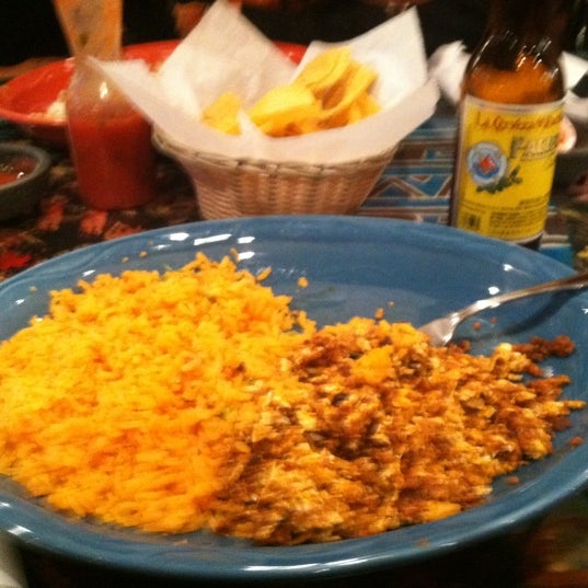 Photo taken at Los Agaves Mexican Grill by Brandon K. on 1/1/2012