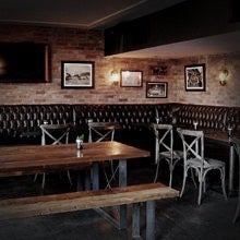 It has all the makings of a cool hangout: vintage photos and fixtures, leather seating and exposed brick with a heavy helping of modern hardware and California cuisine.