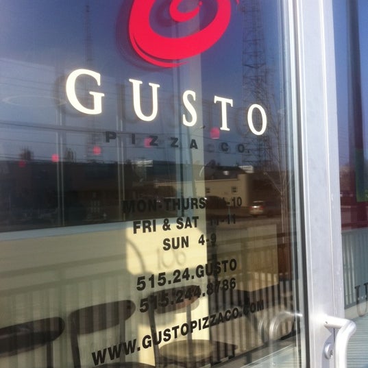 Photo taken at Gusto Pizza Co. by Chris S. on 3/3/2011