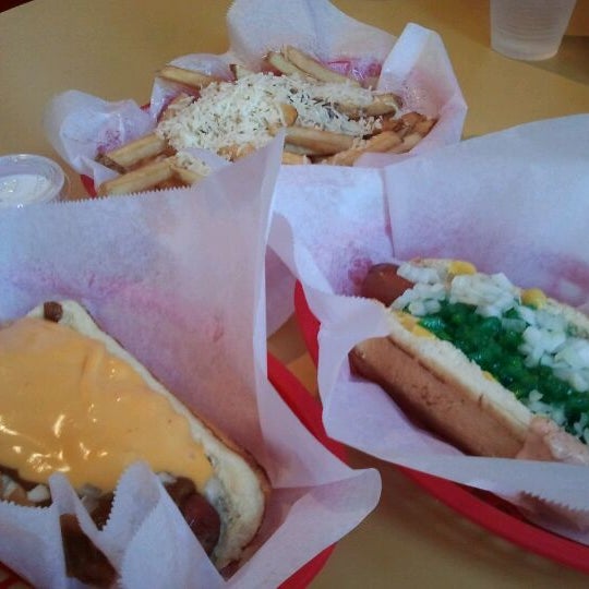 Photo taken at The Slaw Dogs at the Village by Bryan D. on 5/27/2012