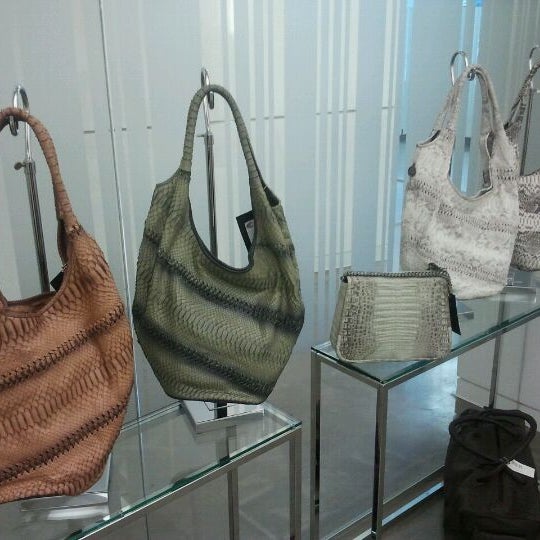 Photo taken at Cashhimi Showroom by Jackie M. on 9/1/2011